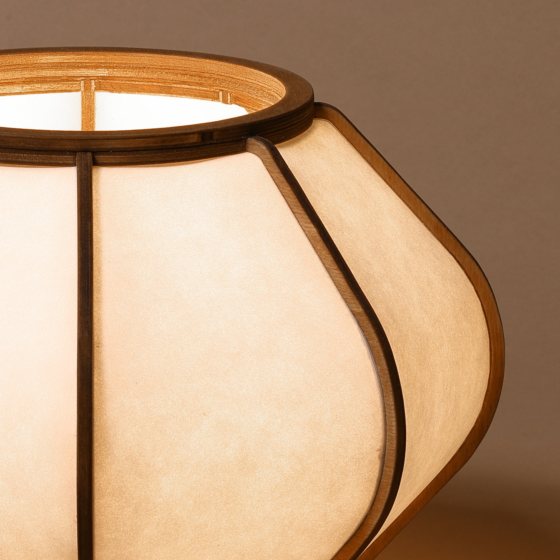 Design lamp in wood and Japanese paper, handmade, made in France. Maguelone Poulain.