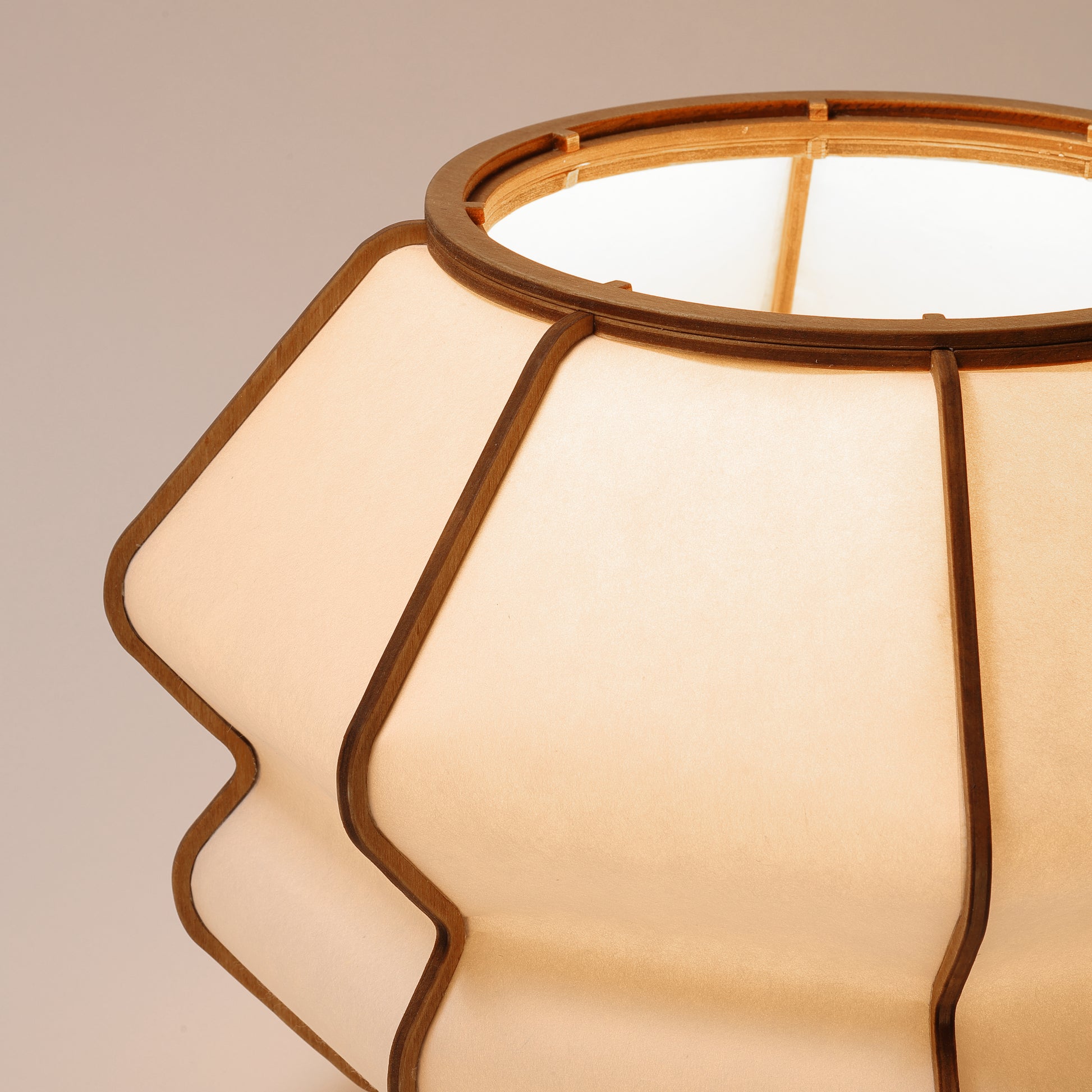 Design lamp in wood and Japanese paper, handmade, made in France. Maguelone Poulain.