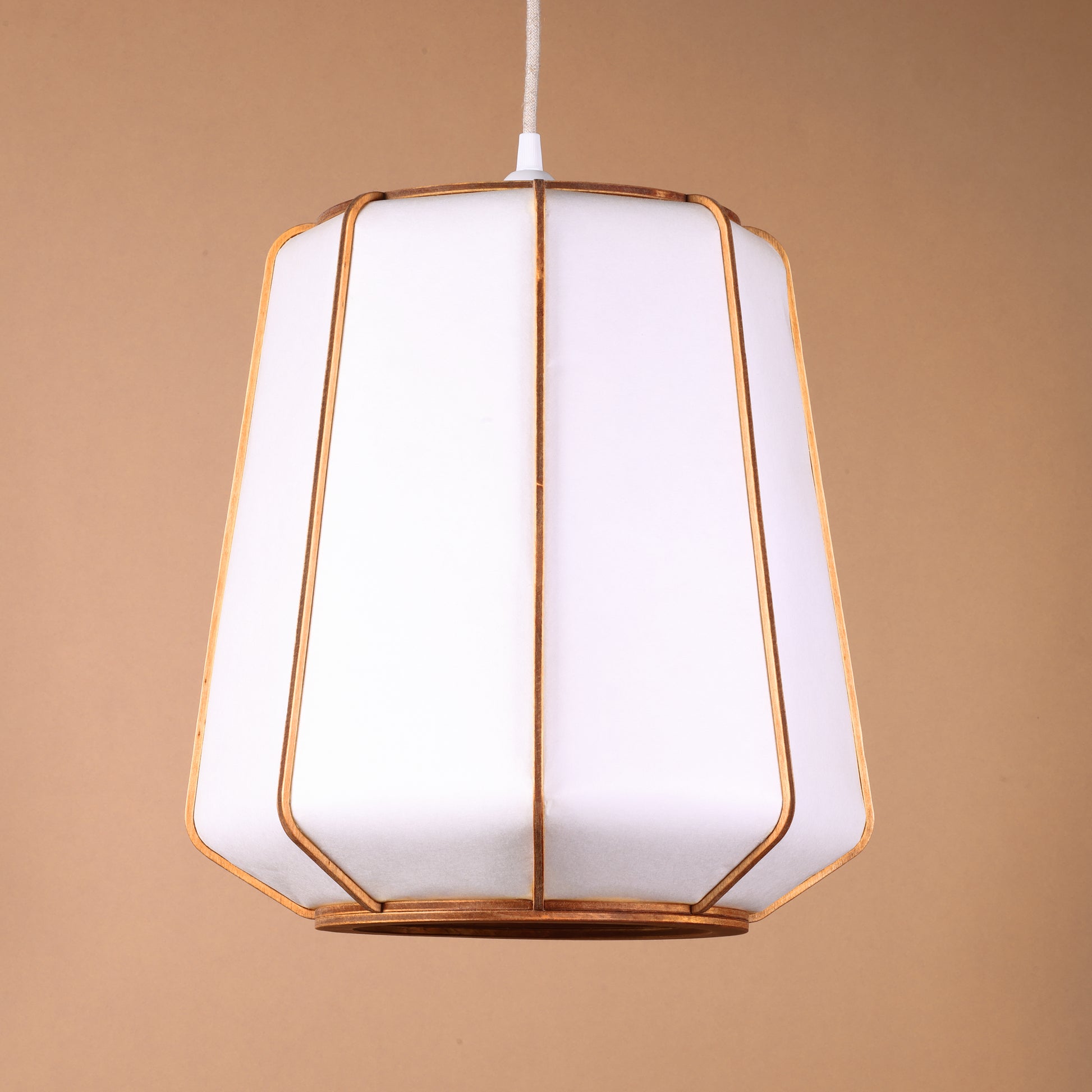 Design lamp in wood and Japanese paper, handmade, made in France. Maguelone Poulain.