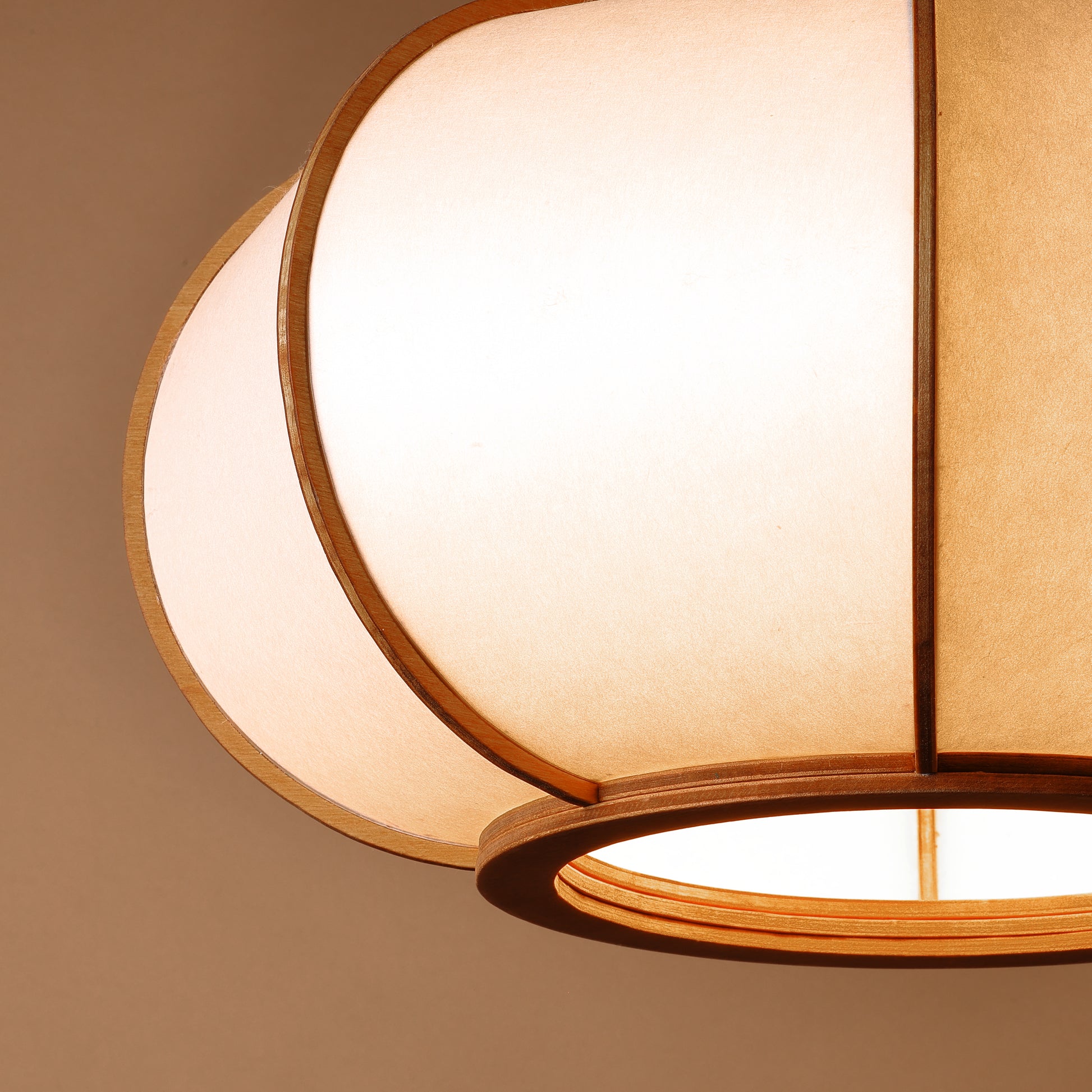 Design lamp in wood and Japanese paper, handmade, made in France. Maguelone Poulain.