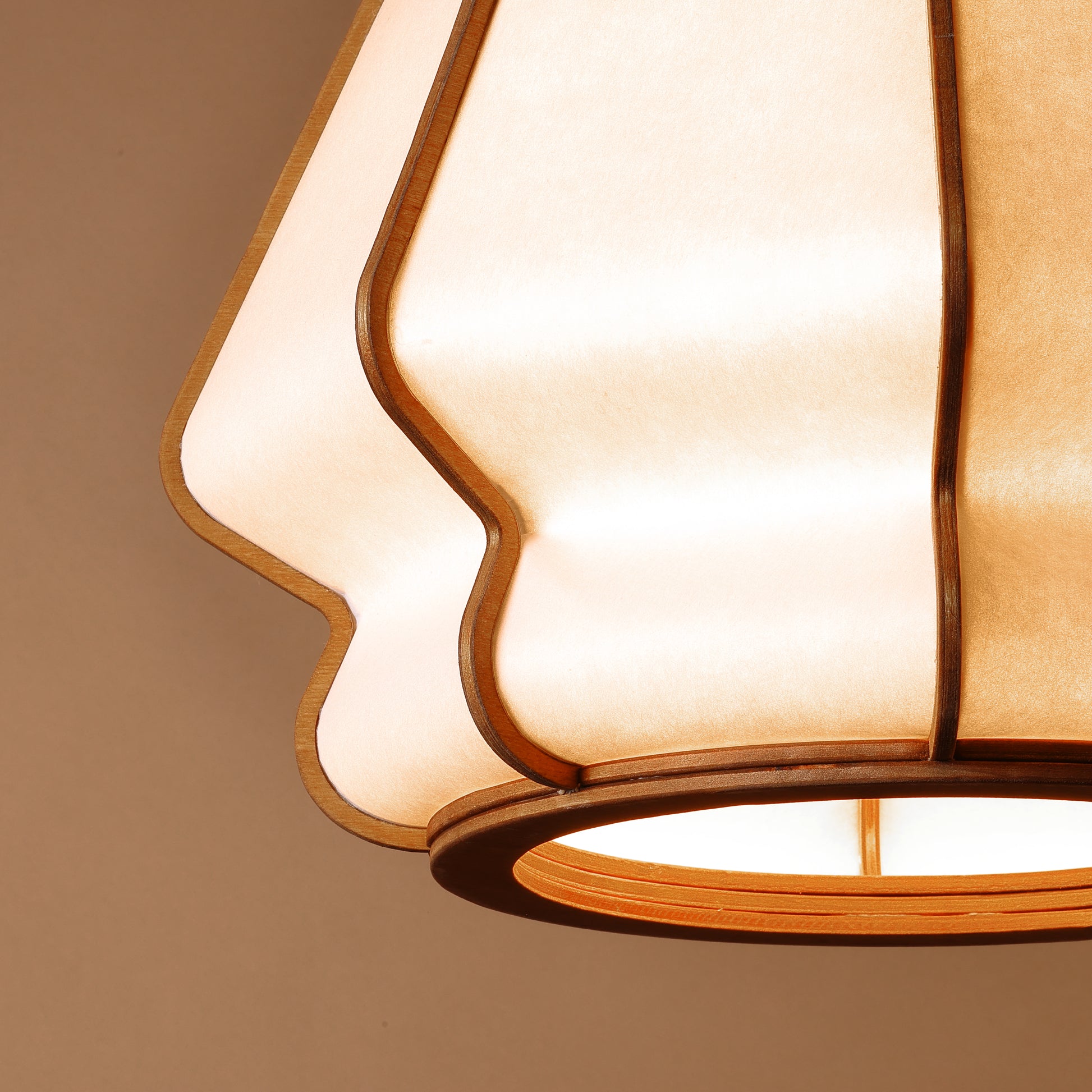 Design lamp in wood and Japanese paper, handmade, made in France. Maguelone Poulain.