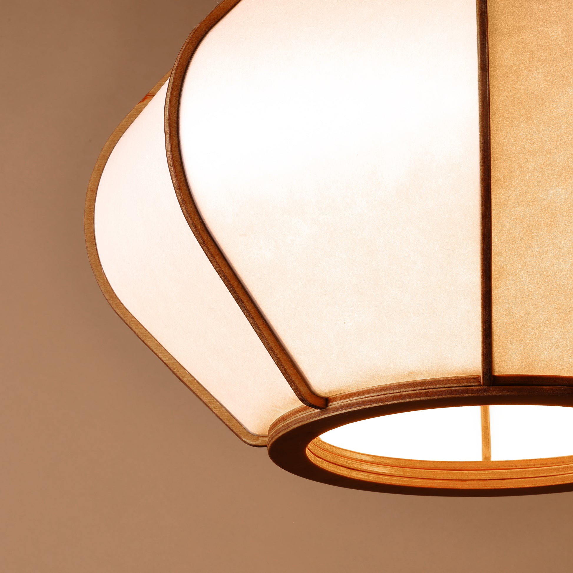 Design lamp in wood and Japanese paper, handmade, made in France. Maguelone Poulain.