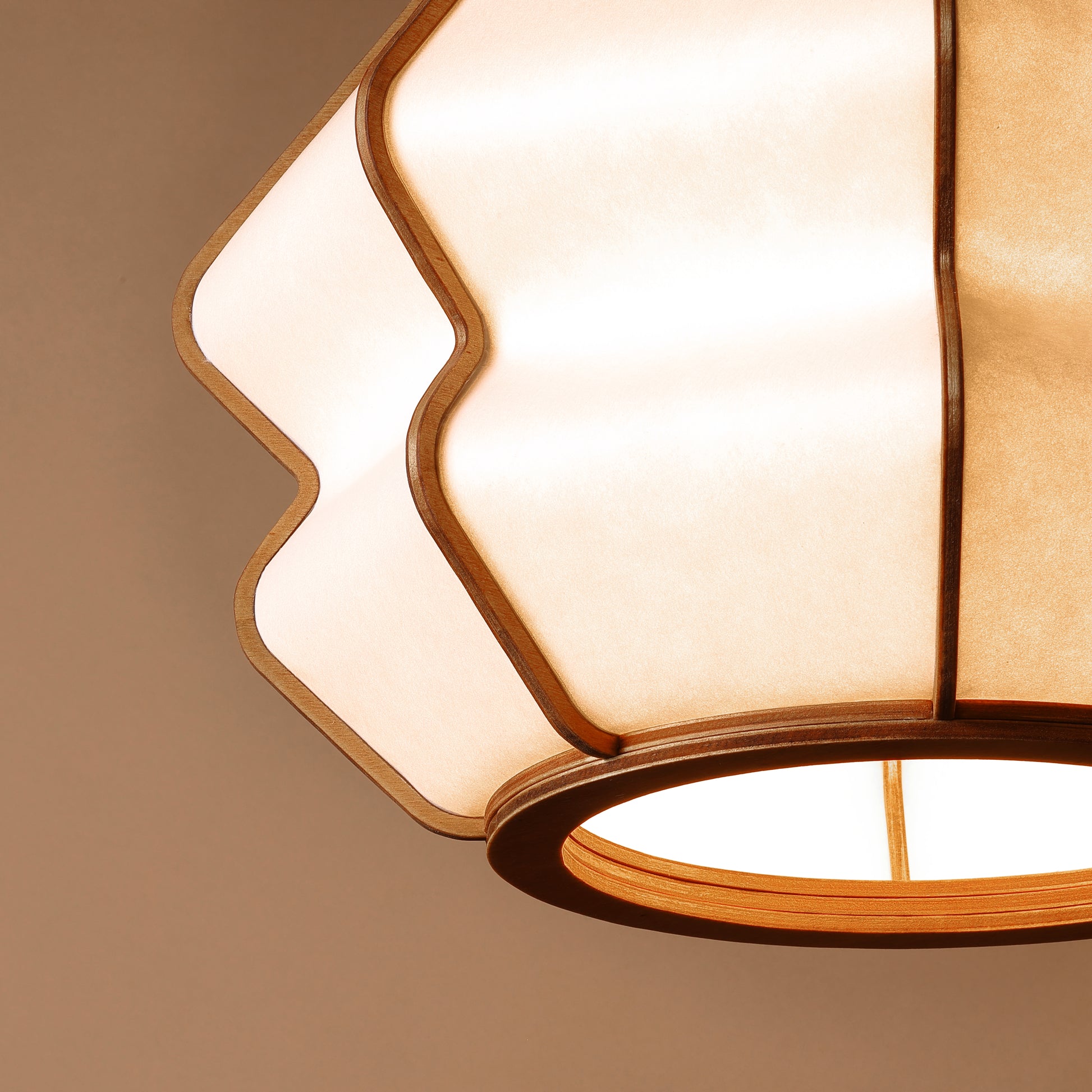 Design lamp in wood and Japanese paper, handmade, made in France. Maguelone Poulain.