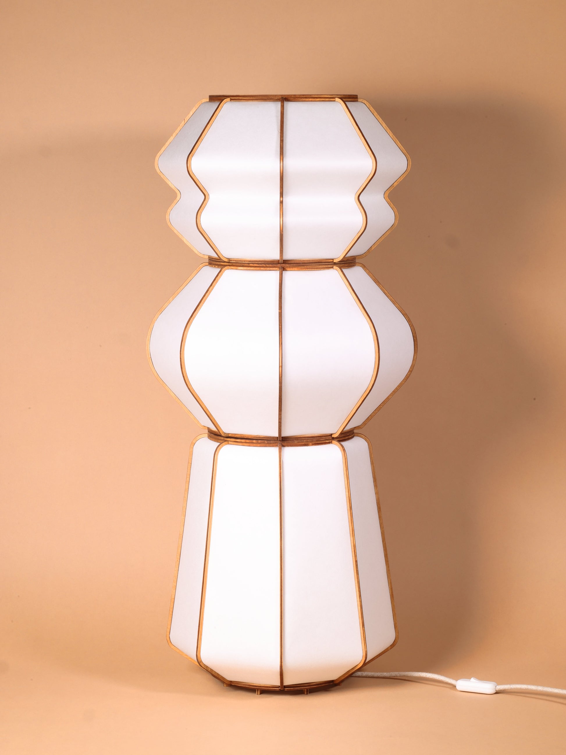 Design lamp in wood and Japanese paper, handmade, made in France. Maguelone Poulain.